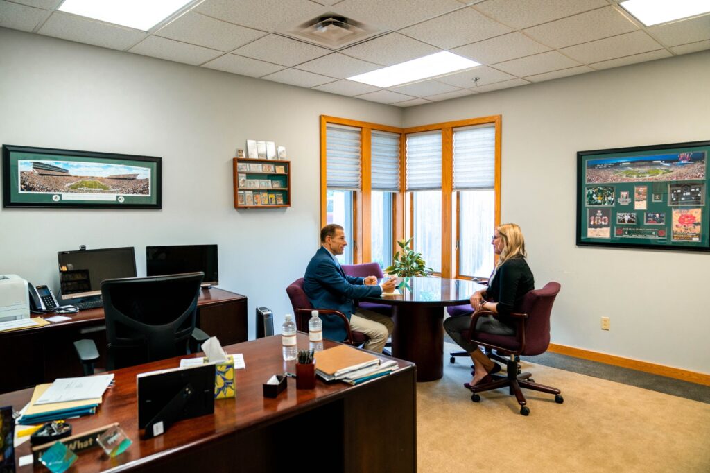 A client in Wiser's office planning for their retirement in Kalamazoo.